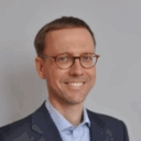 Tomasz Łukaszewicz,<br/> CEO and Co-Founder